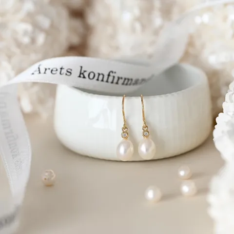 Ovalen 7 - 8 mm süßwasserperle, aaa-qualität brillantohrringen in 14 karat gold mit diamanten 