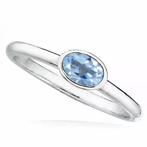 ovaler blauem Ring aus rhodiniertem Silber