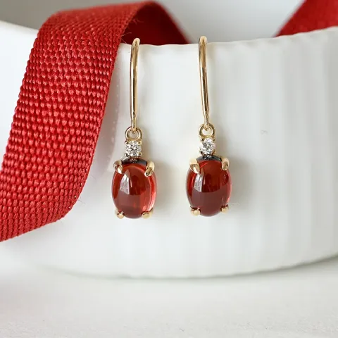 ovalen Granat Diamantohrringe in 14 Karat Gold mit Granat und Diamant
