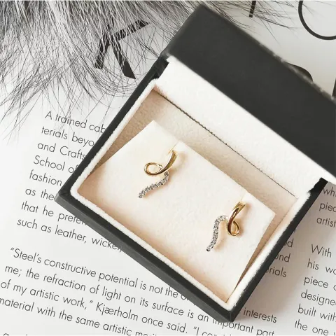 Diamant ohrringe in 14 karat gold und weißgold mit diamanten
