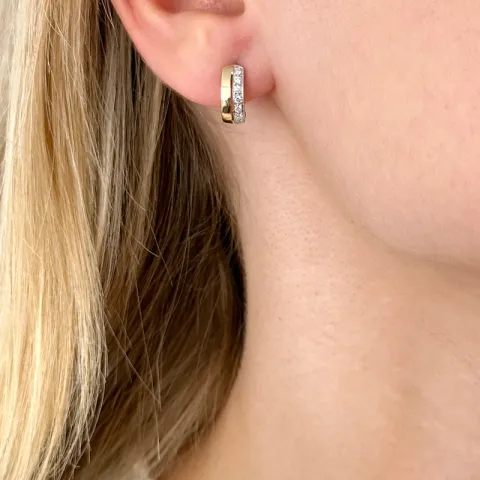 Diamant ohrringe in 14 karat gold und weißgold mit diamanten