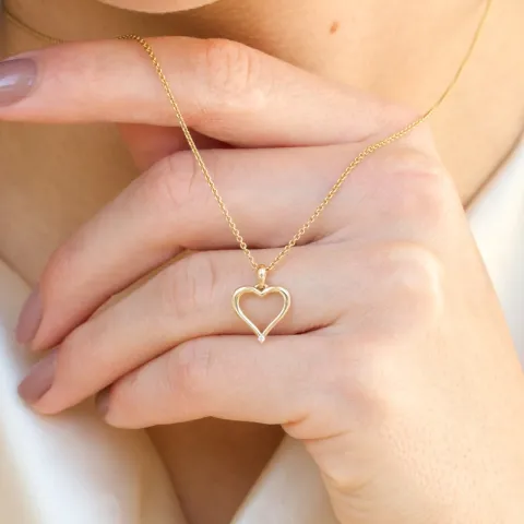 Herz Diamantanhänger in 14 karat Gold 0,01 ct