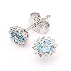 Diamant Rosettenohrstecker in 14 Karat Weißgold mit Diamanten und Topasen
