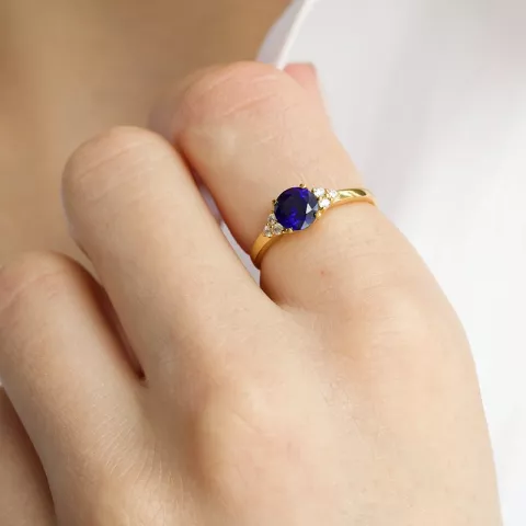blauem Ring aus 9 Karat Gold