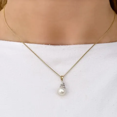 Perle anhänger in 14 karat gold- und weißgold 0,07 ct