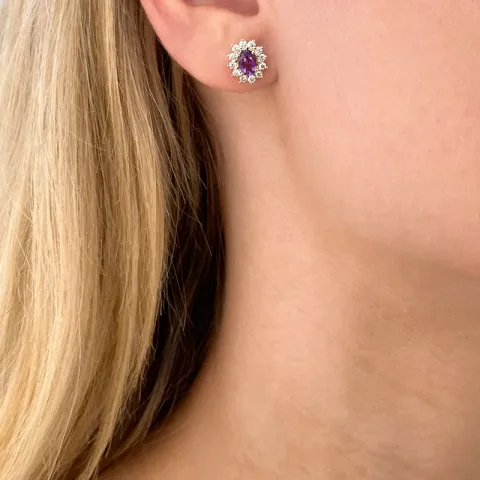 Rosettenohrstecker in 14 karat gold mit diamanten und amethysten
