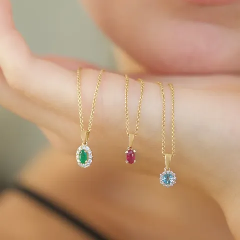 ovaler Smaragd Diamantanhänger in 14 karat Gold 0,25 ct 0,15 ct