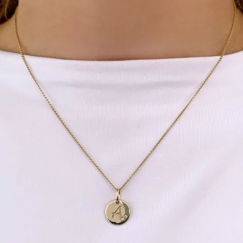 Buchstab a diamant anhänger in 9 karat gold 0,01 ct