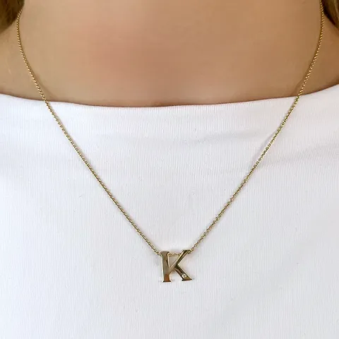 Buchstab k diamant anhänger in 9 karat gold 0,01 ct