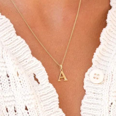 buchstab a Diamant Anhänger in 9 karat Gold 0,01 ct