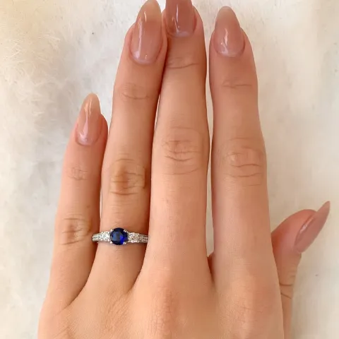 Ringe: blauem Zirkon Ring aus rhodiniertem Silber