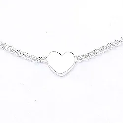 Herz armband aus silber und herzförmiger anhänger aus silber