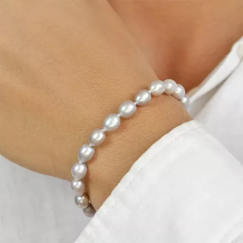 18 cm ellipsenförmiger Perlenarmband mit Süßwasserperle.