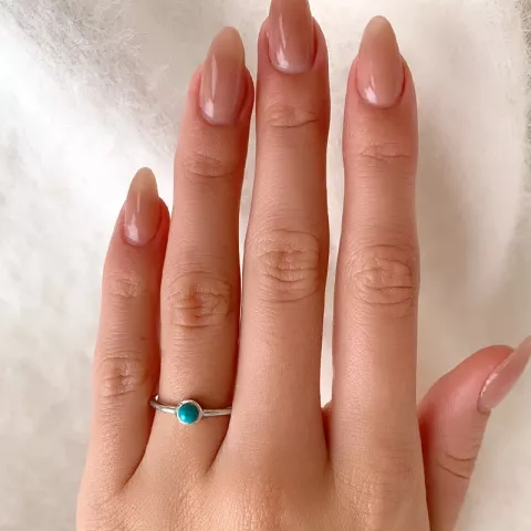 Runder blauem Ring aus Silber