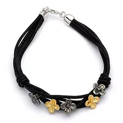 schwarz Armband aus Leder und Blumenanhänger aus vergoldetem und rhodiniertem Silber