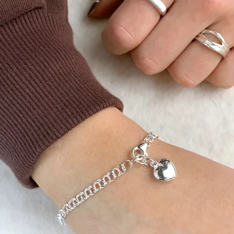 Armband aus Silber und Herzförmiger Anhänger aus Silber