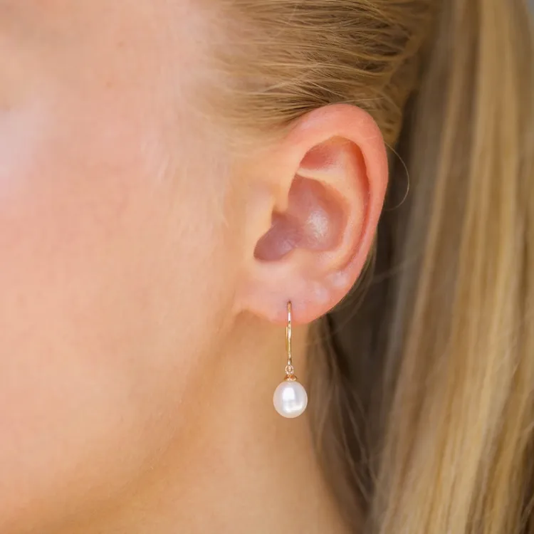 Ovalen 7 - 8 mm süßwasserperle, aaa-qualität ohrringe in 14 karat gold mit 