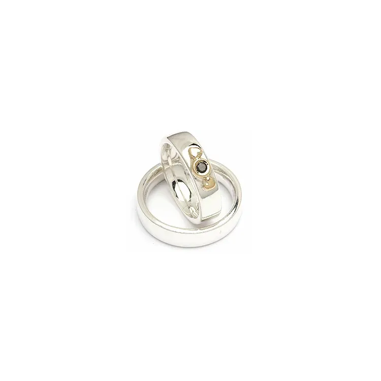Trauringe von rs of scandinavia in Silber und Gelbgold 0,05 ct