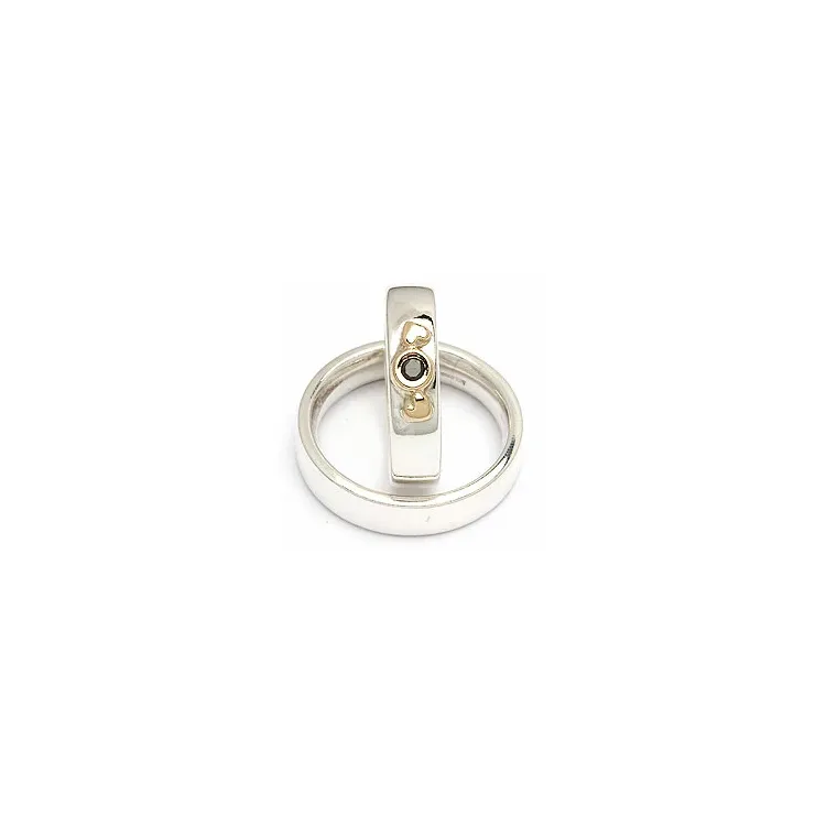 Trauringe von rs of scandinavia in Silber und Gelbgold 0,05 ct