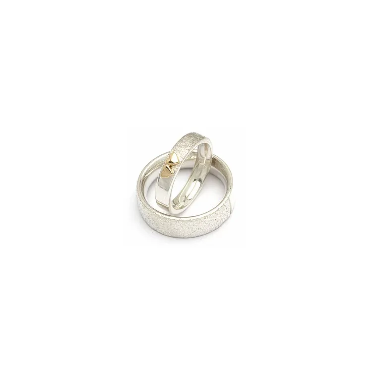 Trauringe von rs of scandinavia in Silber und Gelbgold