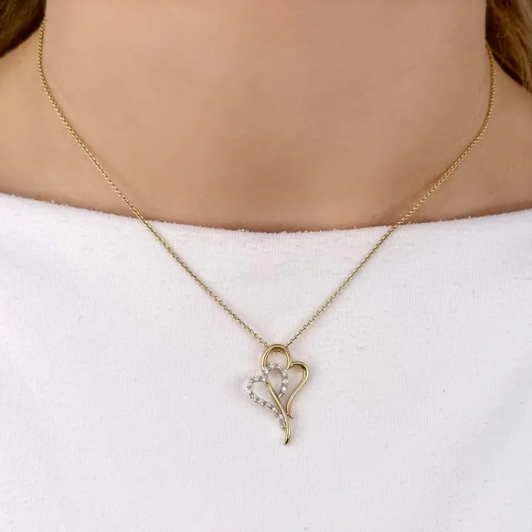 Herz Anhänger in 14 karat Gold- und Weißgold 0,11 ct