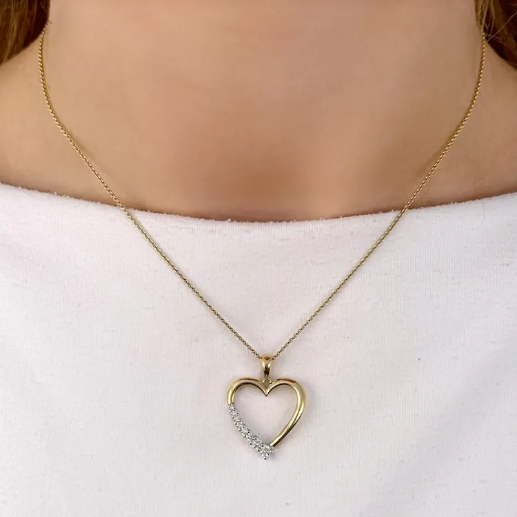 Herz Diamant Anhänger in 14 karat Gold- und Weißgold 0,26 ct