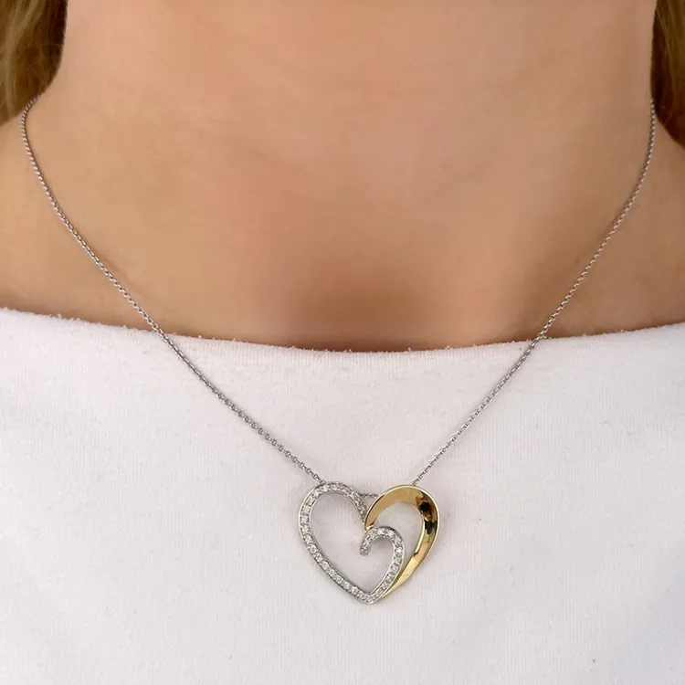 Großer Herz Anhänger in 14 karat Gold- und Weißgold 0,20 ct