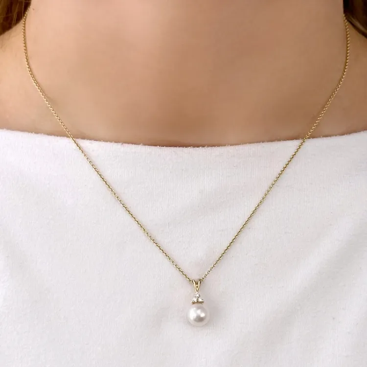 Perle Anhänger in 14 karat Gold 0,05 ct