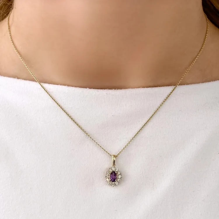 Amethyst Rosettenanhänger in 14 karat Gold 0,26 ct 0,45 ct