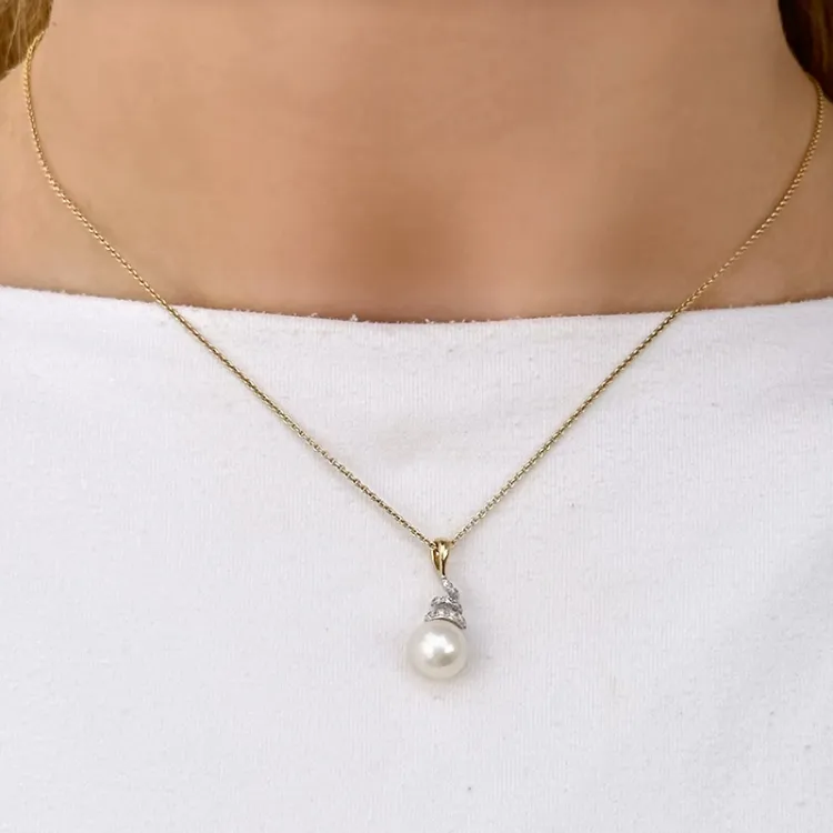 Perle anhänger in 14 karat gold- und weißgold 0,07 ct