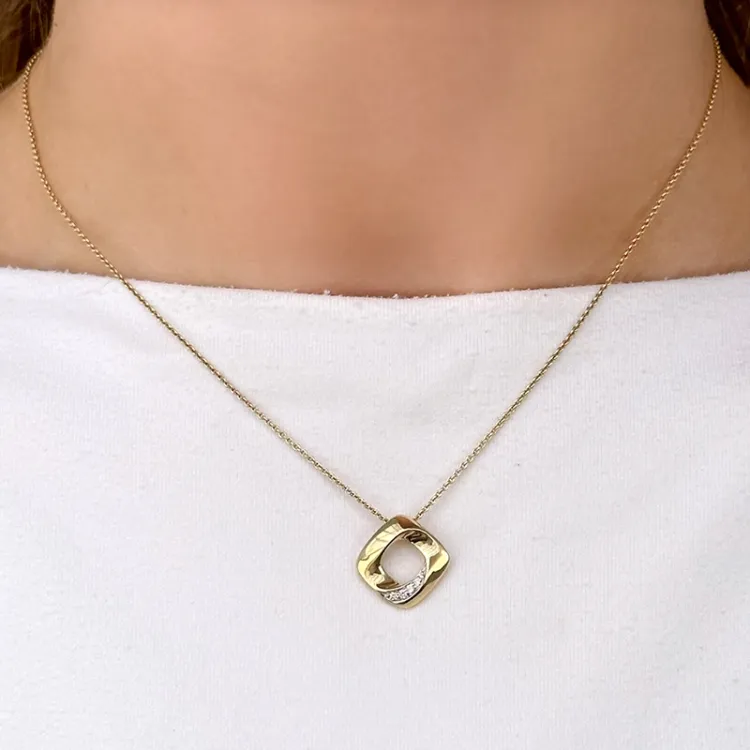 Diamantanhänger in 14 karat Gold- und Weißgold 0,05 ct