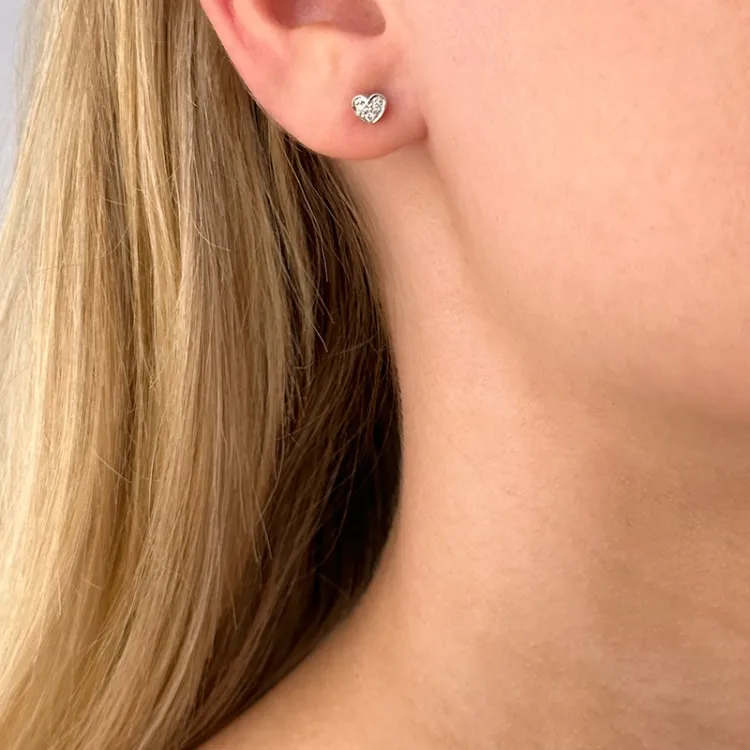 Herz ohrringe in 14 karat gold und weißgold mit diamanten