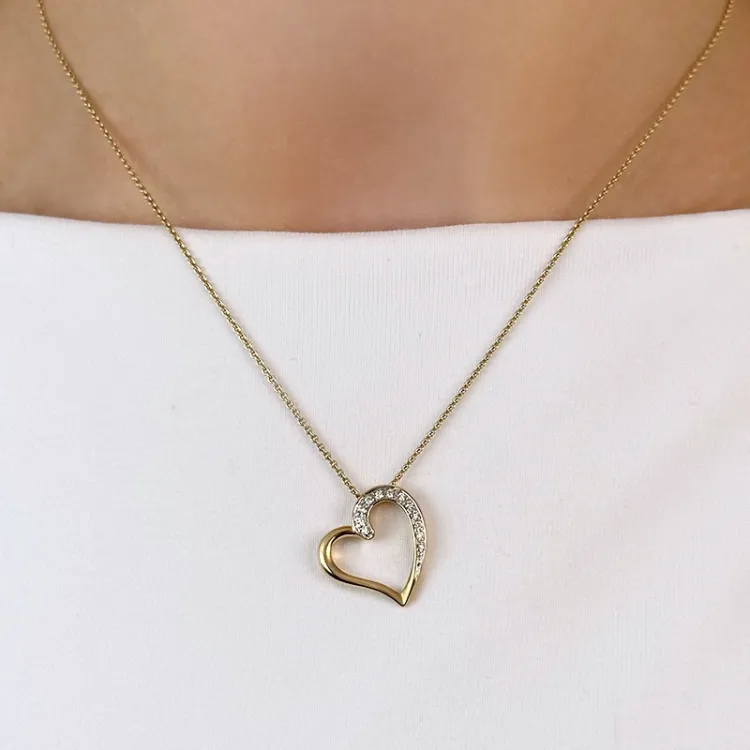 Trendy Herz Diamantanhänger in 14 karat Gold- und Weißgold 0,08 ct