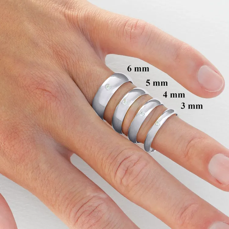 4 und 3 mm trauringe aus 9 Karat Weißgold 0,02 ct - set