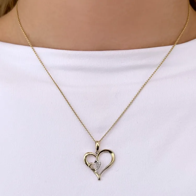 Herz anhänger in 9 karat gold- und weißgold 0,03 ct ct