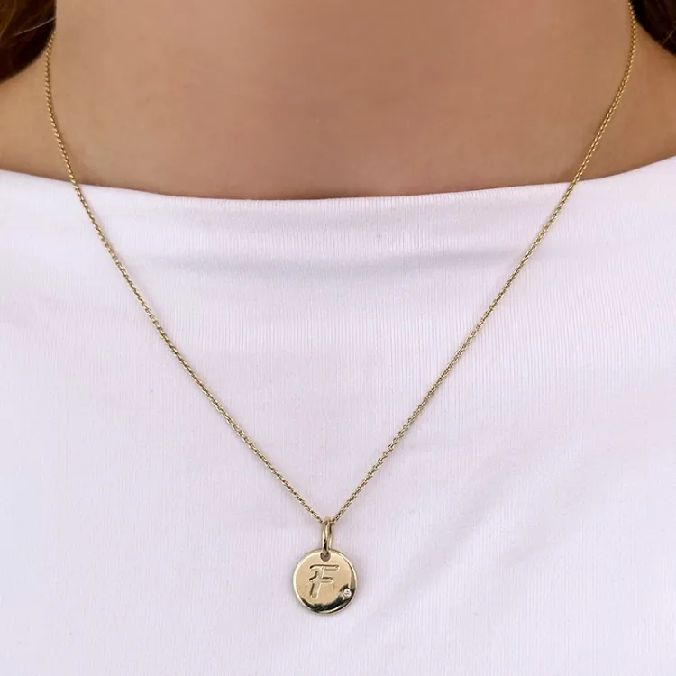 Buchstab f diamant anhänger in 9 karat gold 0,01 ct
