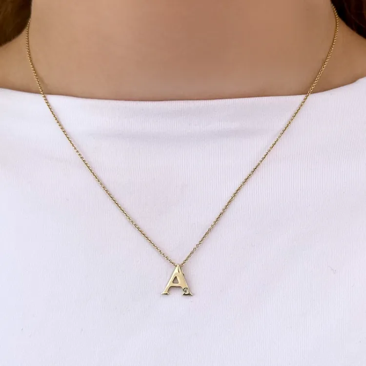 buchstab a Diamant Anhänger in 9 karat Gold 0,01 ct