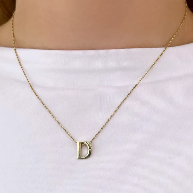 Buchstab d diamant anhänger in 9 karat gold 0,01 ct