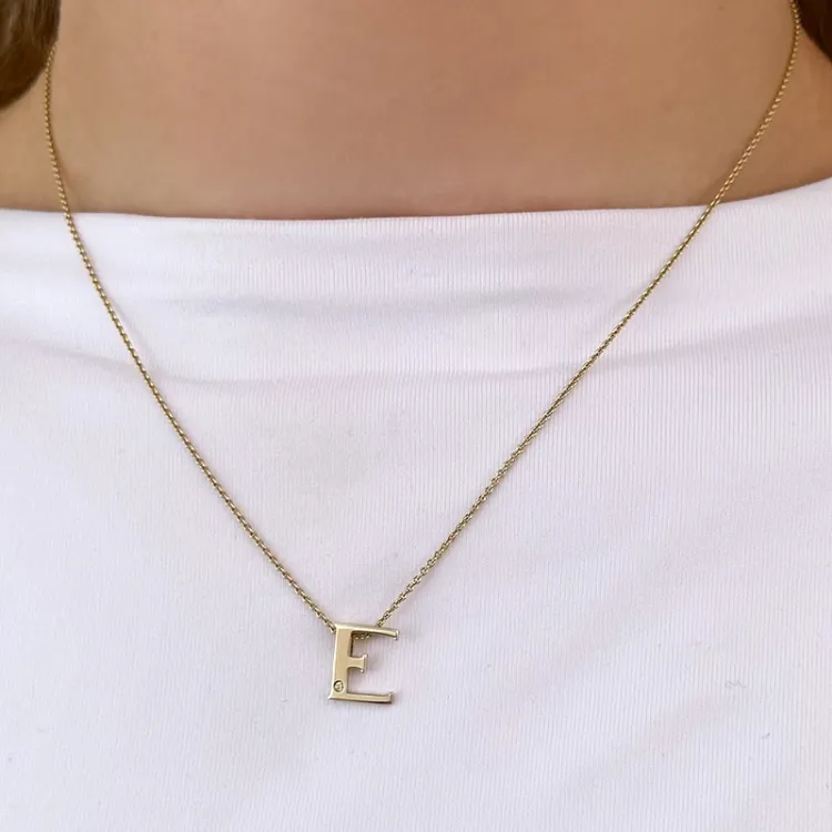 Buchstab e diamant anhänger in 9 karat gold 0,01 ct