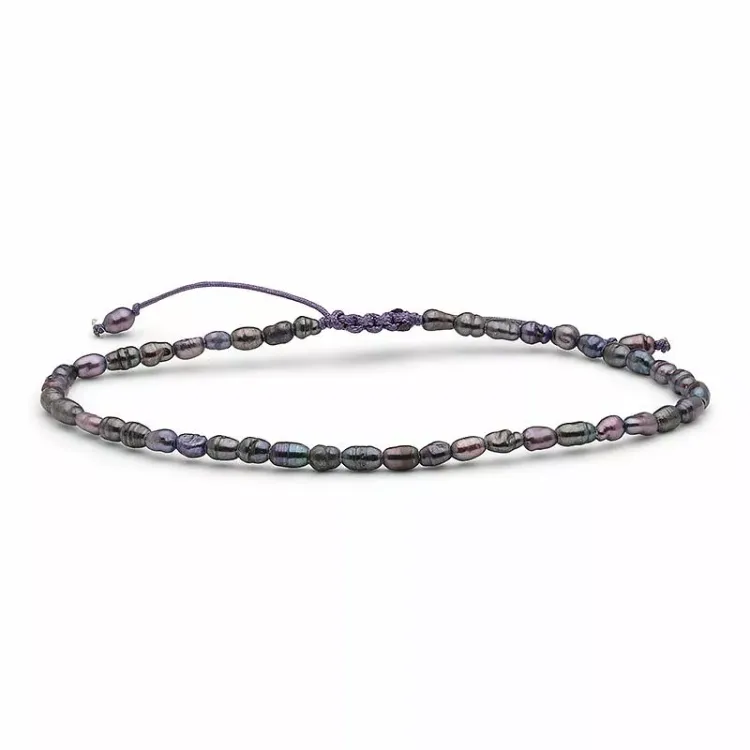 violettem Perlenarmband mit Süßwasserperle.