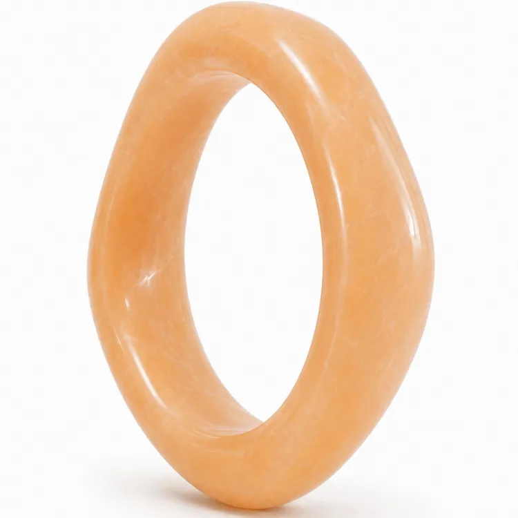 orangefarbenem bangle aus Harz - AURA