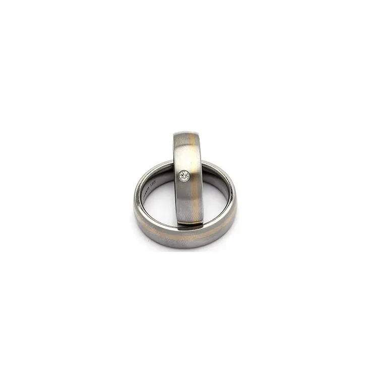 Trauringe aus 14 Karat Stahl und Weissgold 0,035 ct - set