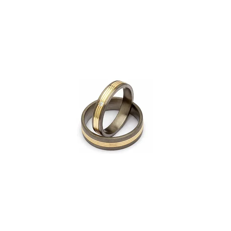 Trauringe in Titanium und Gold 0,025 ct