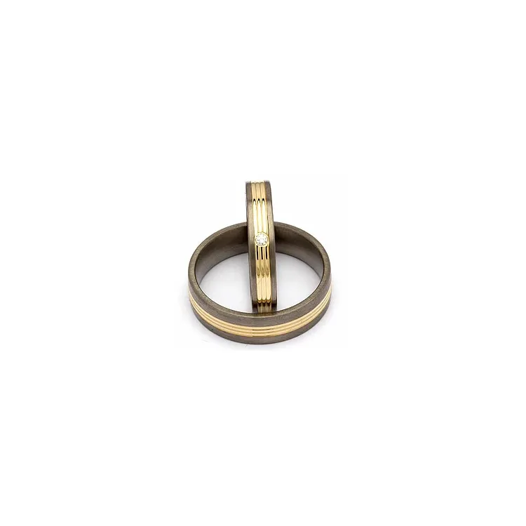Trauringe in Titanium und Gold 0,025 ct