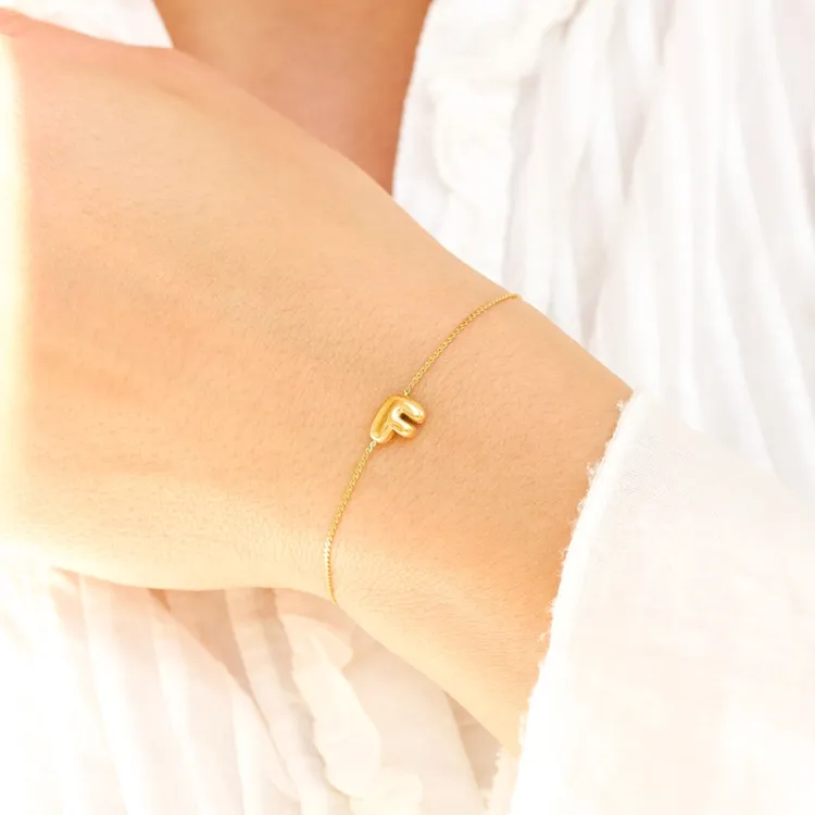 Wasserfest buchstab f Armband aus vergoldetem Stahl - OCEANA