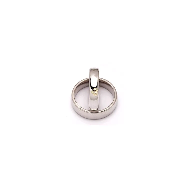 Trauringe in Silber und Gelbgold 0,01 ct
