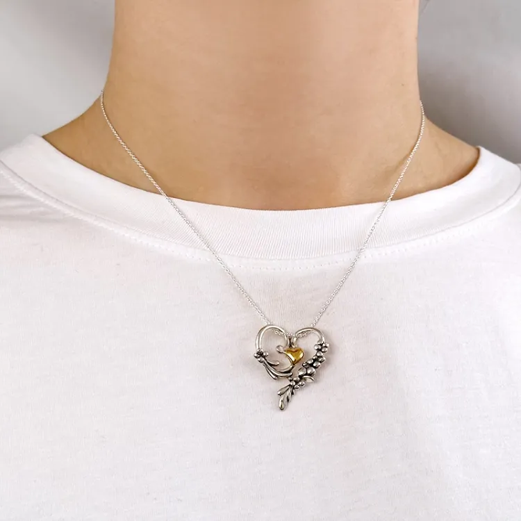 Herz Anhänger aus oxidiertem Sterlingsilber und vergoldetem Sterlingsilber