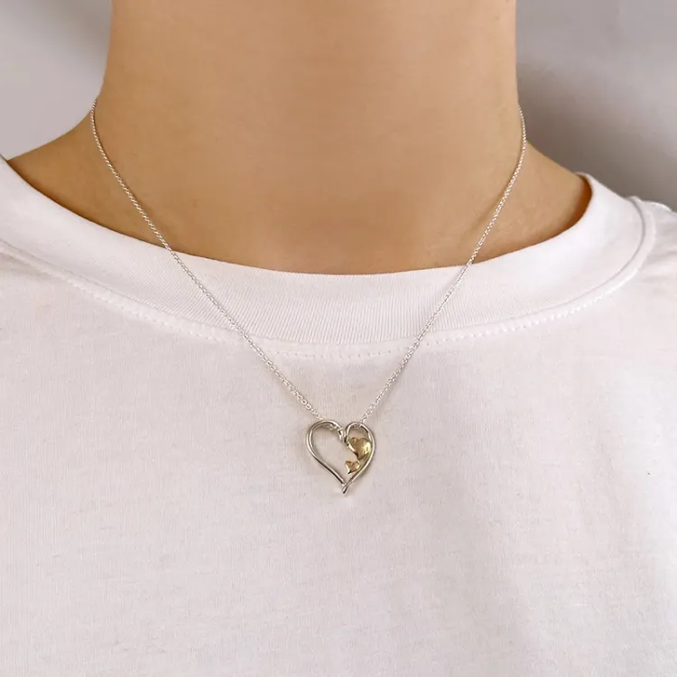 Herz Anhänger aus Silber und 8 Karat Gold