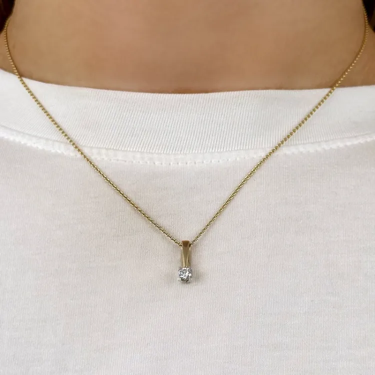 Diamant Solitäranhänger in 14 karat Gold- und Weißgold 0,20 ct