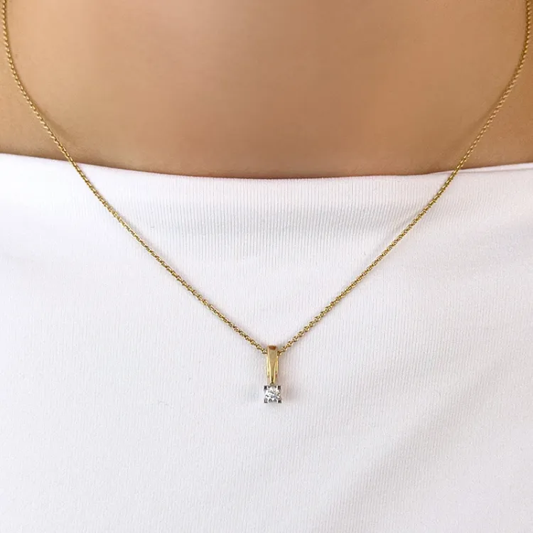 Diamant Solitäranhänger in 14 karat Gold- und Weißgold 0,10 ct